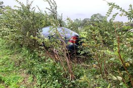 Auto in de slip door modder