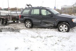 Auto op het ijs na ongeval in Obdam