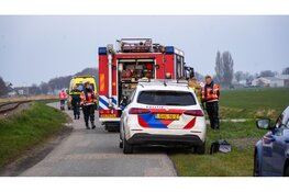 Scootmobiel te water in Midwoud, hondjes gered