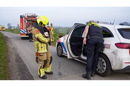 Scootmobiel te water in Midwoud, hondjes gered