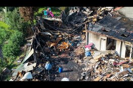 Zeer grote uitslaande brand in loods Lambertschaag