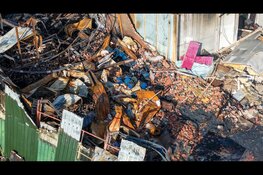 Zeer grote uitslaande brand in loods Lambertschaag